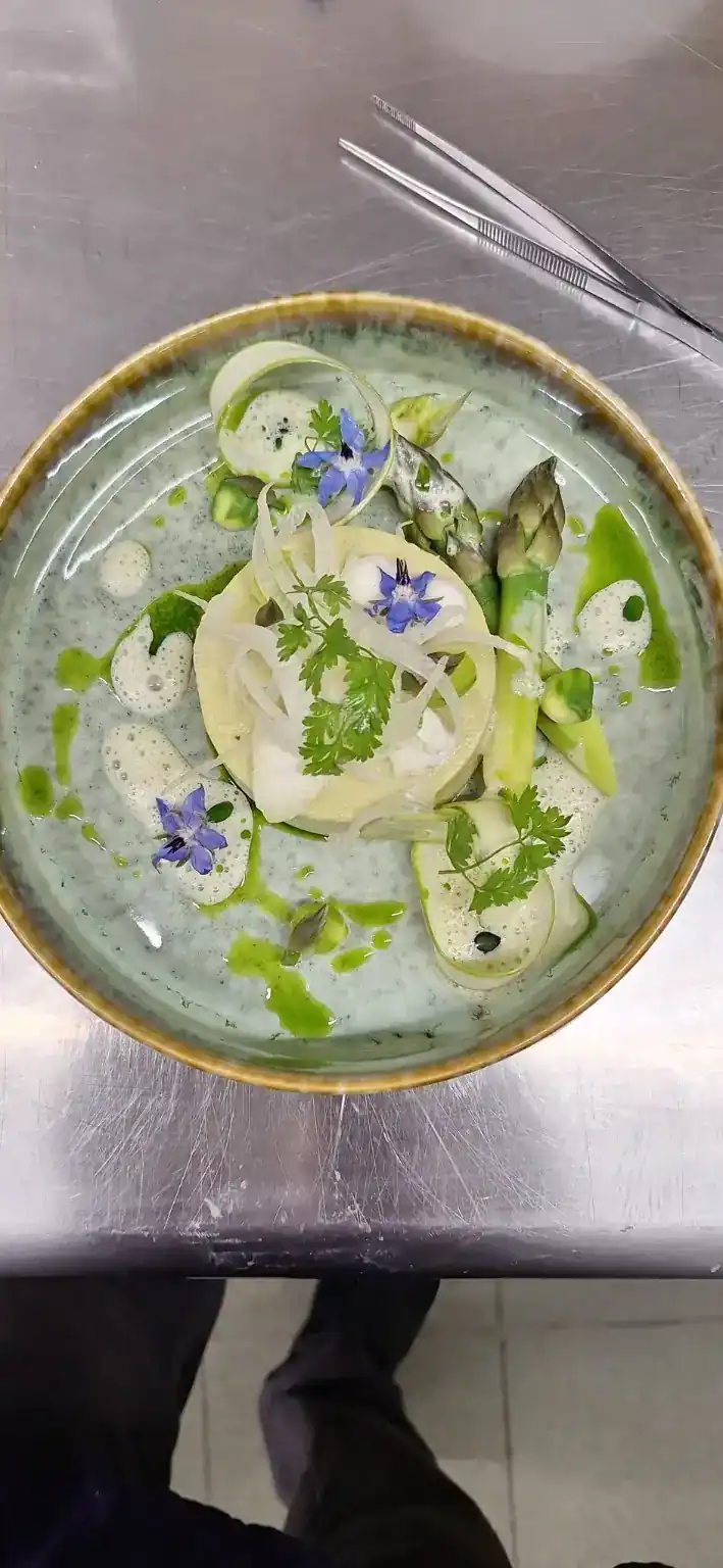 Seasonal burrata, stone fruit and tomato plate by Riho Heinmets